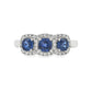 18K White gold ring set with three deep blue sapphires, each surrounded by diamond halo. Item J35620 - ABC Jewelry Co.