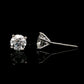 14K White gold stud earrings set with 2 round brilliant diamonds. Item J34919 - ABC Jewelry Co. 