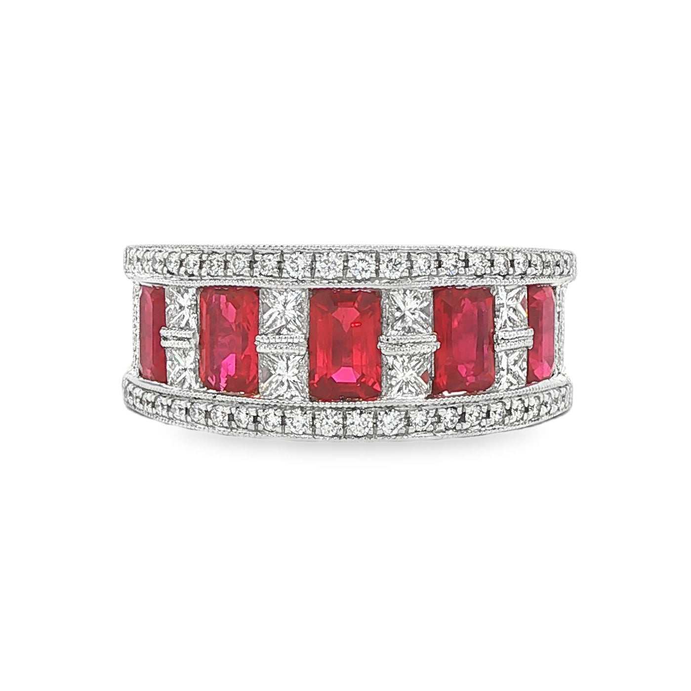 18K White gold ring set with emerald cut rubies and princess cut diamonds. Item J35824 - ABC Jewelry Co. 