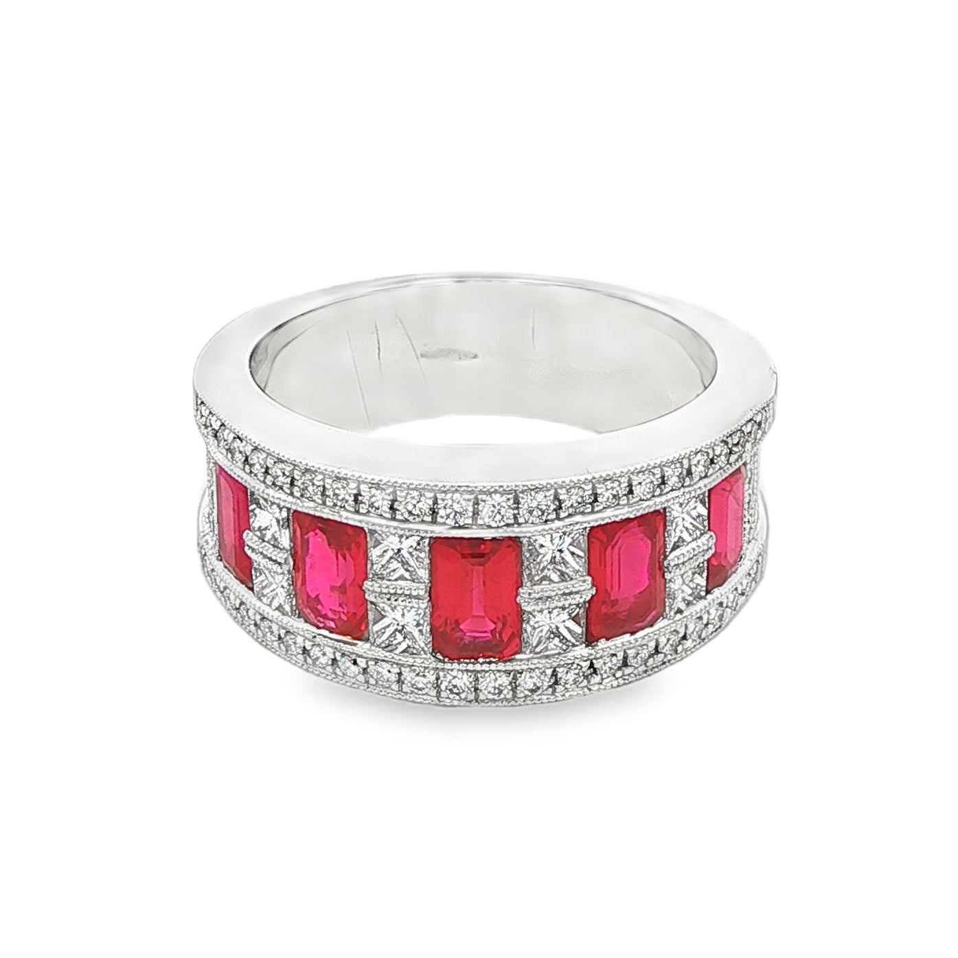 18K White gold ring set with emerald cut rubies and princess cut diamonds. Item J35824 - ABC Jewelry Co. 