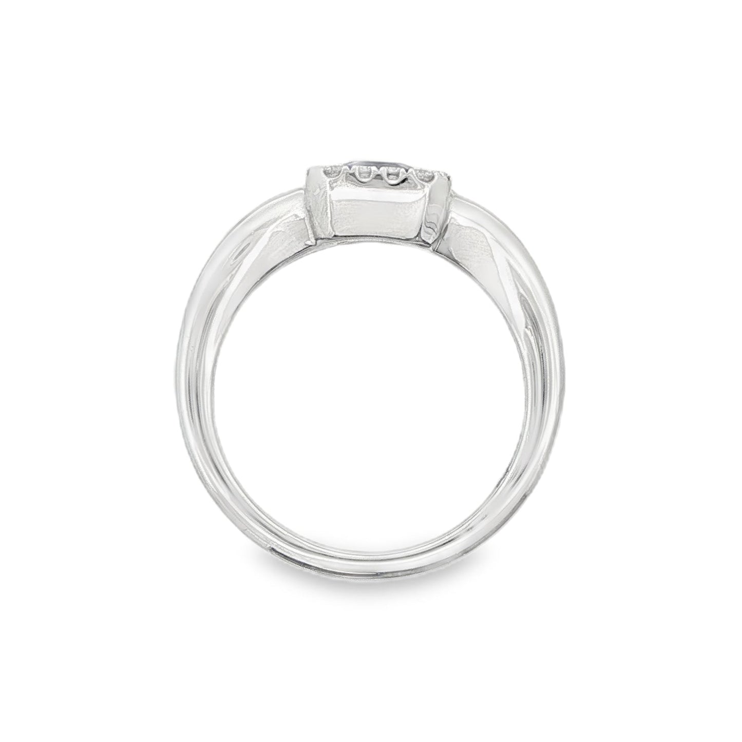 14K White gold ring set with an emerald cut deep blue sapphire surrounded by a halo of round brilliant diamonds. Item J35826 - ABC Jewelry Co. 