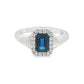 14K White gold ring set with an emerald cut deep blue sapphire surrounded by a halo of round brilliant diamonds. Item J35826 - ABC Jewelry Co. 