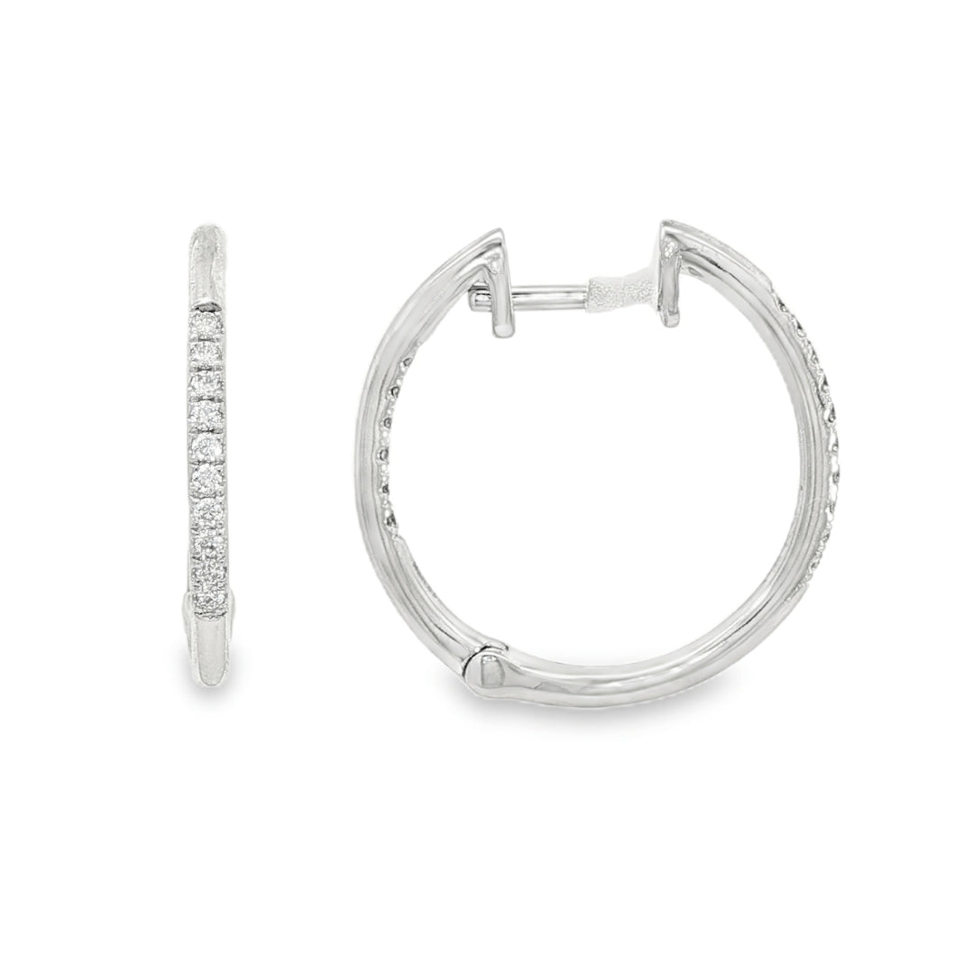 14K White gold hoop earrings accented with a row of round brilliant diamonds. Item J35835 - ABC Jewelry Co. 