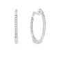 14K White gold hoop earrings accented with a row of round brilliant diamonds. Item J35835 - ABC Jewelry Co. 