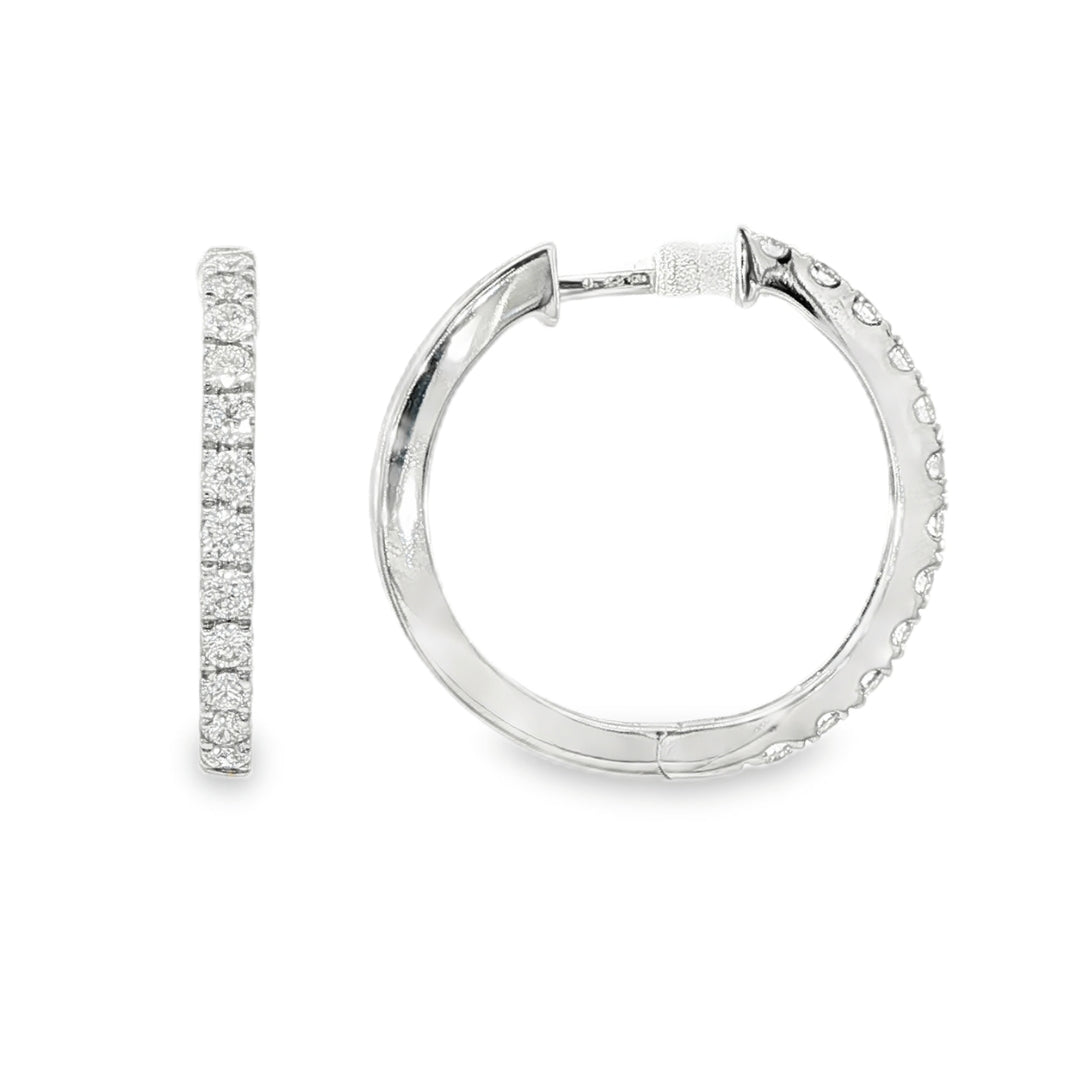 18K White gold hoop earrings set with a row of round brilliant diamonds. Item J36133 - ABC Jewelry Co. 