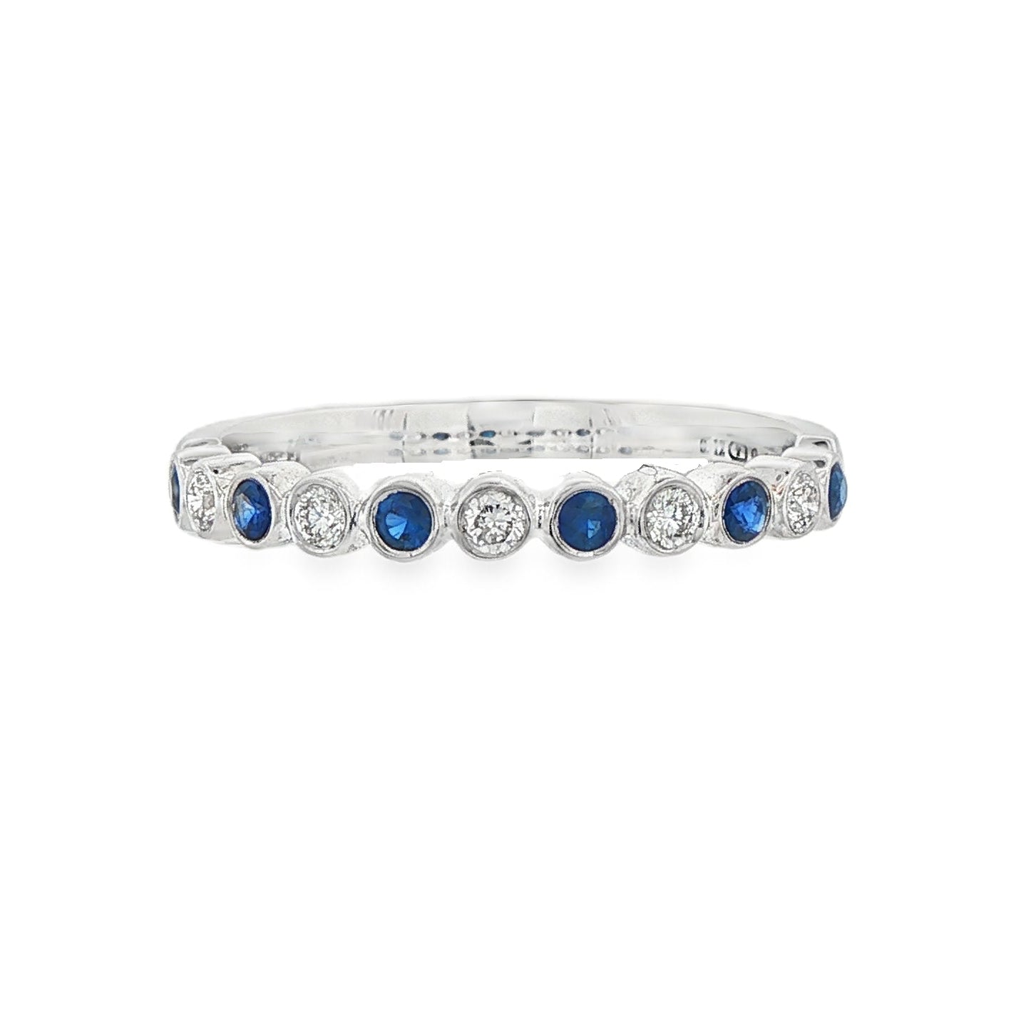 18K White gold band bezel set with alternating diamonds and blue sapphires. Item J36377 - ABC Jewelry Co. 