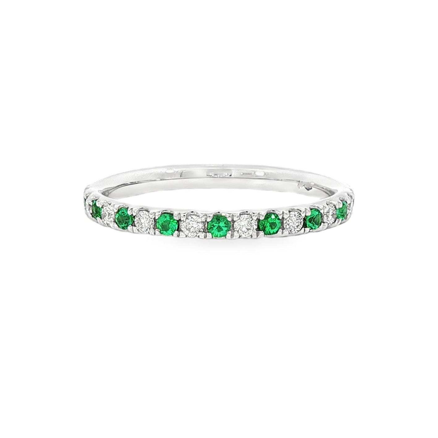18K White gold band set with alternating diamonds and emeralds. Item J36393 - ABC Jewelry Co. 