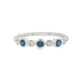 18K White gold band bezel set with blue sapphires and round brilliant diamonds. Item J36395 - ABC Jewelry Co. 