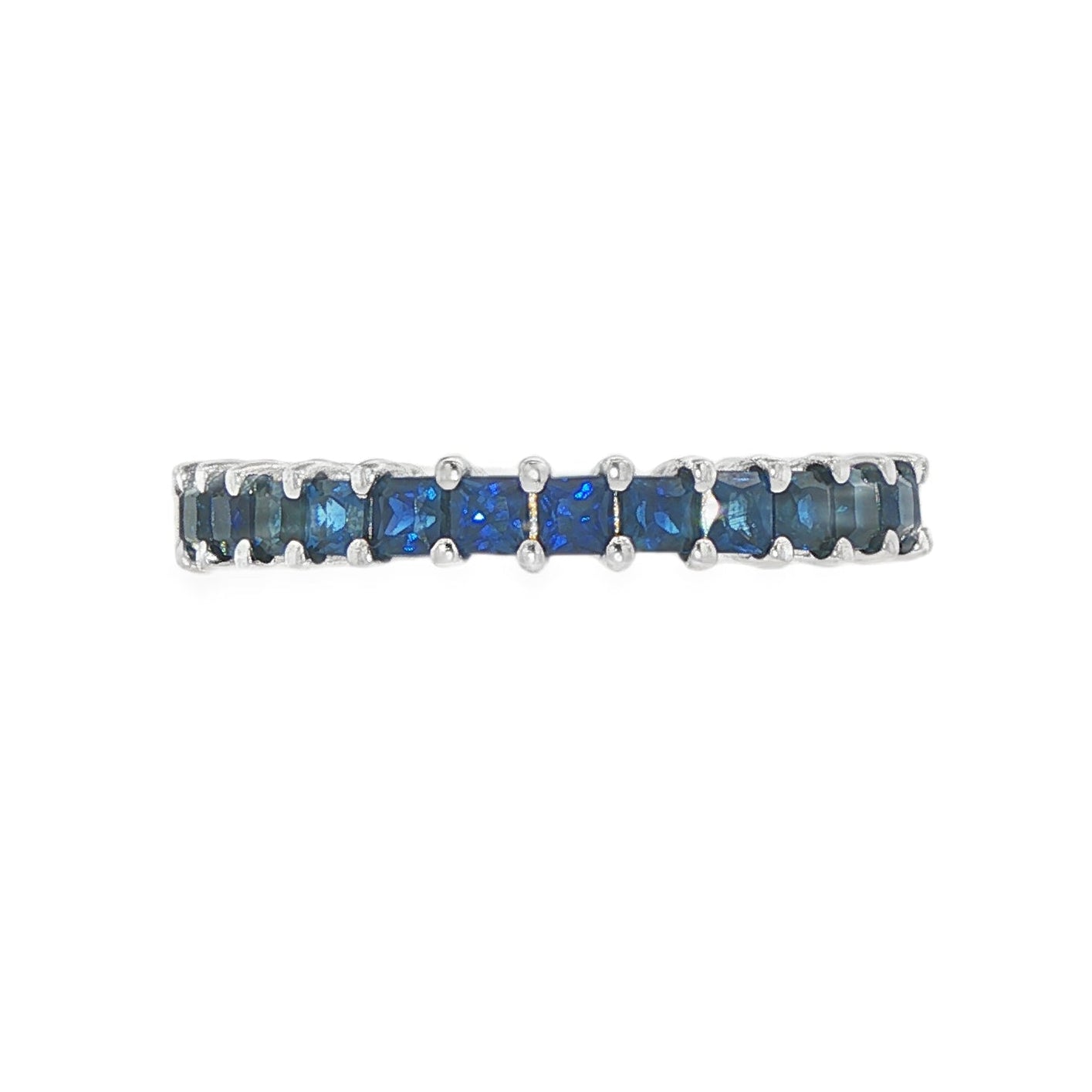 14K White gold eternity band set with princess cut blue sapphires. Item J36403 - ABC Jewelry Co.