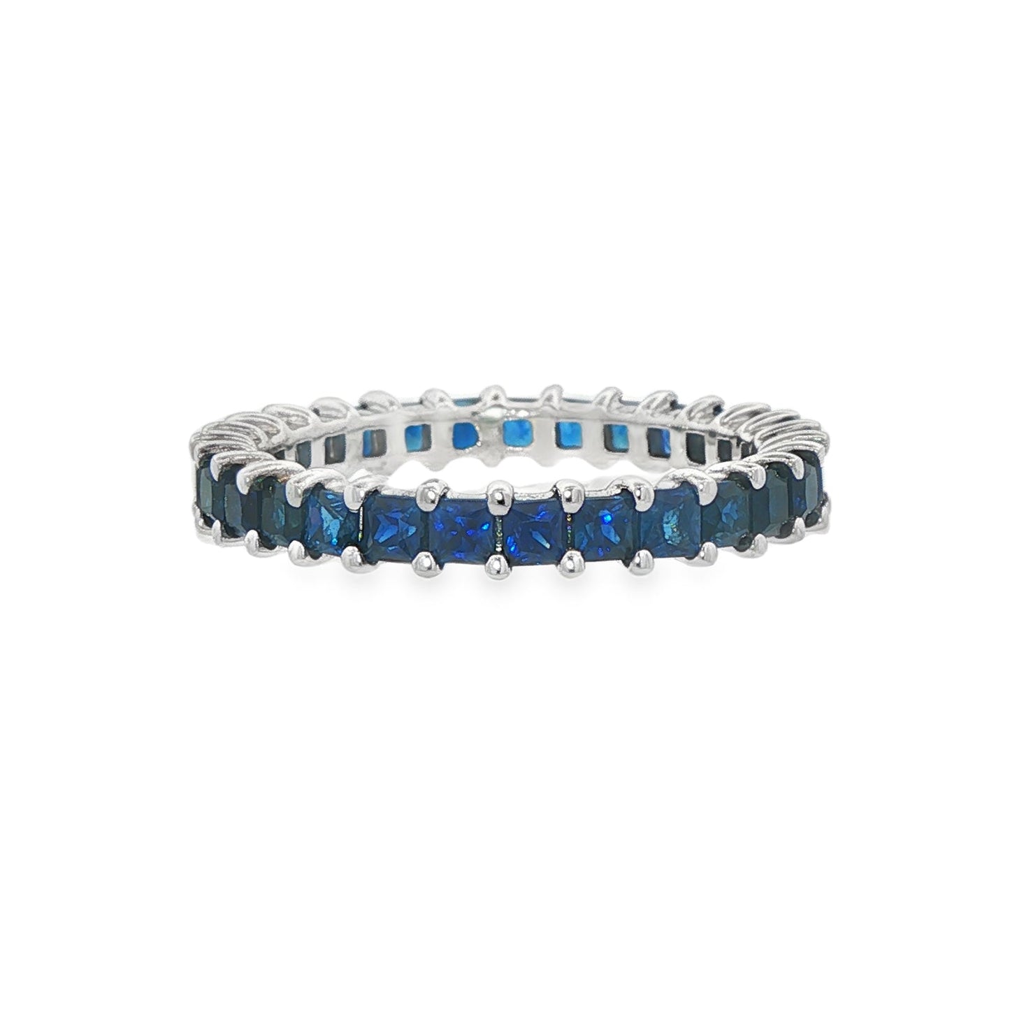 14K White gold eternity band set with princess cut blue sapphires. Item J36403 - ABC Jewelry Co.