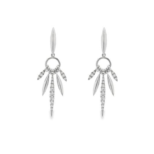 18K White gold earrings with marquise inspired drops set with round brilliant diamonds. Item J36882 - ABC Jewelry Co