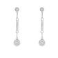 18K White gold dangle earrings with bezel set round brilliant diamonds. Item J36883 - ABC Jewelry Co. 