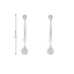 18K White gold dangle earrings with bezel set round brilliant diamonds. Item J36883 - ABC Jewelry Co. 