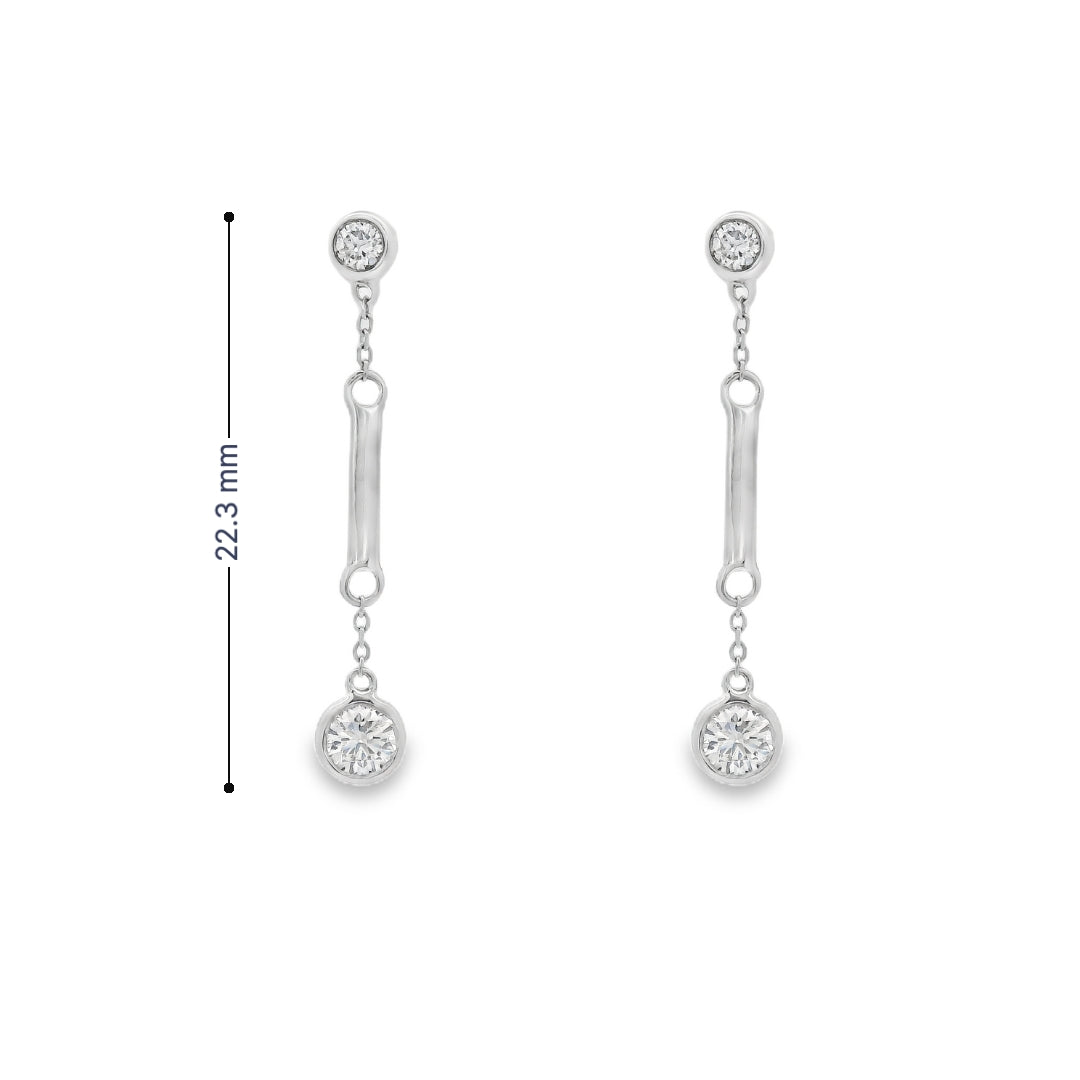 18K White gold dangle earrings with bezel set round brilliant diamonds. Item J36883 - ABC Jewelry Co. 