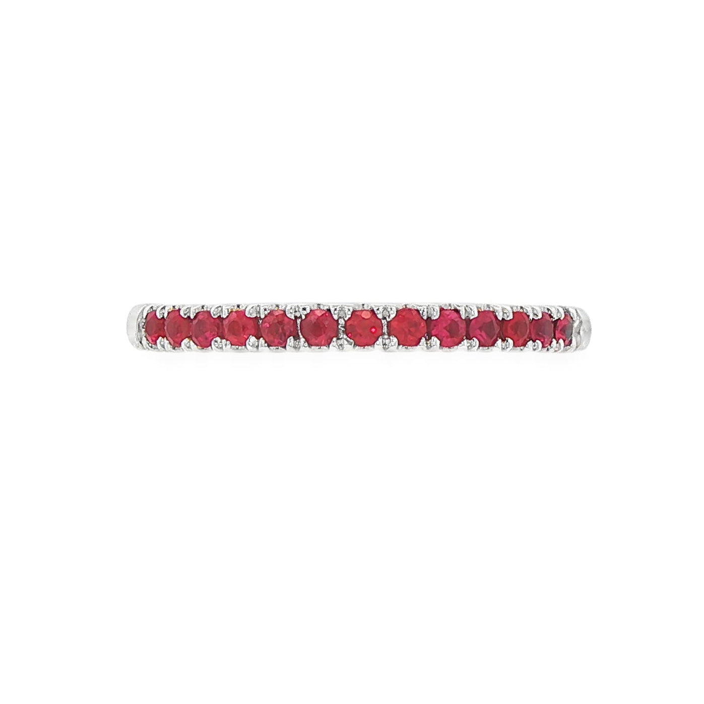18K White gold band set with round brilliant rubies. Item J36902 - ABC Jewelry Co.