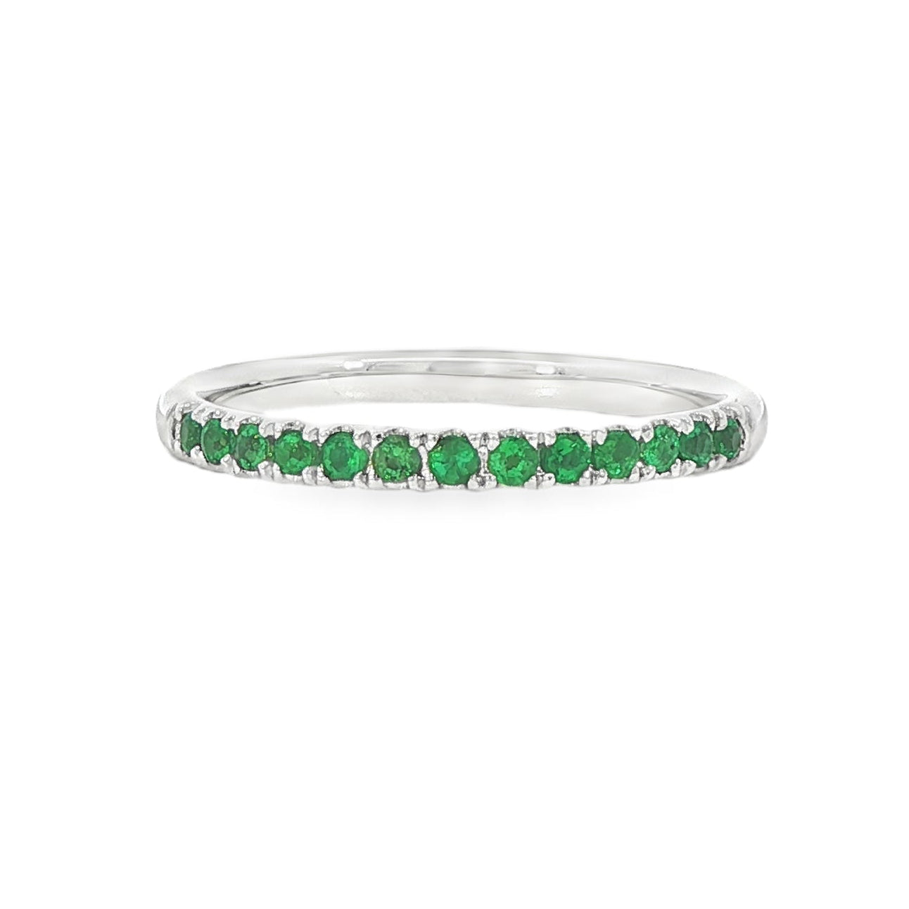 18K White gold band set with round green emeralds. Item J36909 - ABC Jewelry Co