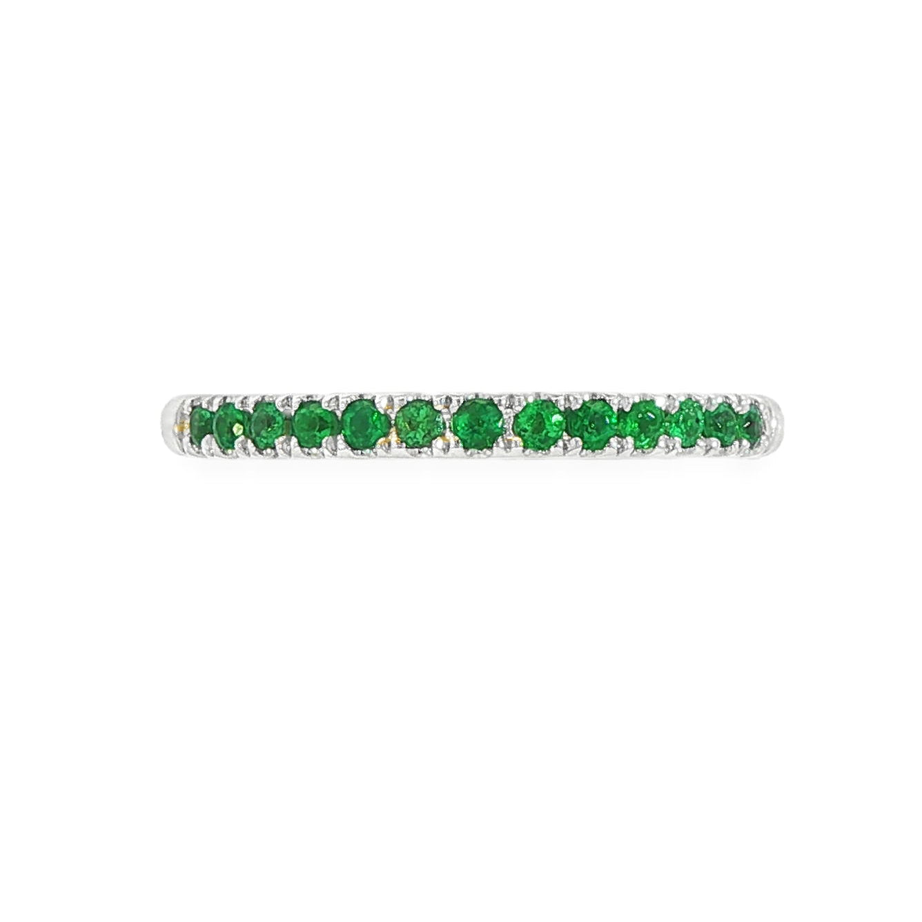 18K White gold band set with round green emeralds. Item J36909 - ABC Jewelry Co