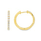 18K Yellow gold hoop earrings set with round brilliant diamonds. Item J37722 - ABC Jewelry Co.