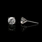 14K White gold stud earrings set with 2 natural mined diamonds. Item J37802 - ABC Jewelry Co