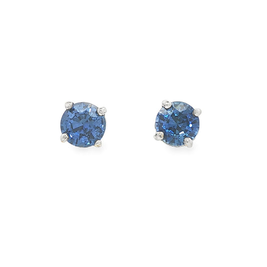 14K White gold stud earrings set with round blue sapphires. Item J37904 - ABC Jewelry