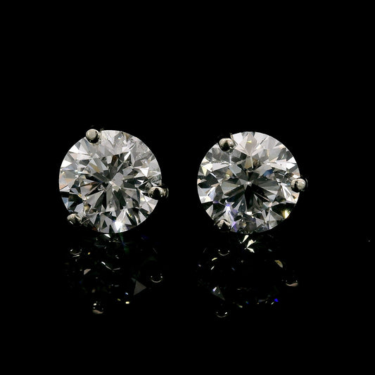 14K White gold studs set with round brilliant diamonds. Item J37908 - ABC Jewelry Co. 