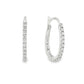 14K White gold oval hoop earrings set with round brilliant diamonds. Item J37963 - ABC Jewelry Co
