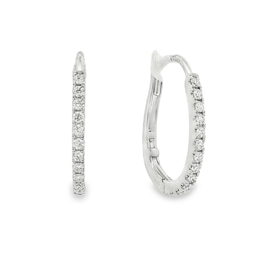 14K White gold oval hoop earrings set with round brilliant diamonds. Item J37963 - ABC Jewelry Co