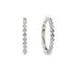 14K White gold hoop earrings set with round brilliant diamonds. Item J37964 - ABC Jewelry Co