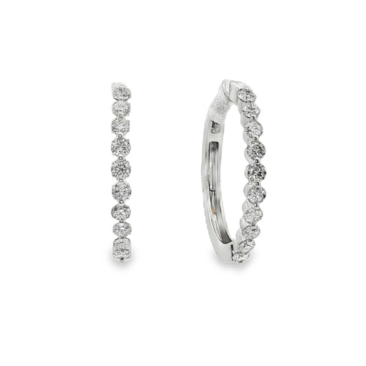 14K White gold hoop earrings set with round brilliant diamonds. Item J37964 - ABC Jewelry Co