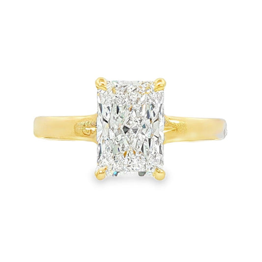 14K Yellow gold solitaire engagement ring set with radiant cut diamond. Item J37991 - ABC Jewelry Co. 