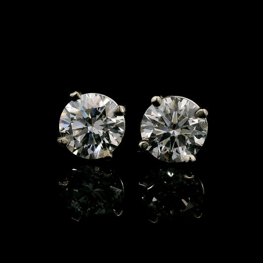 14K White gold studs set with round brilliant diamonds. Item J38143 - ABC Jewelry Co. 