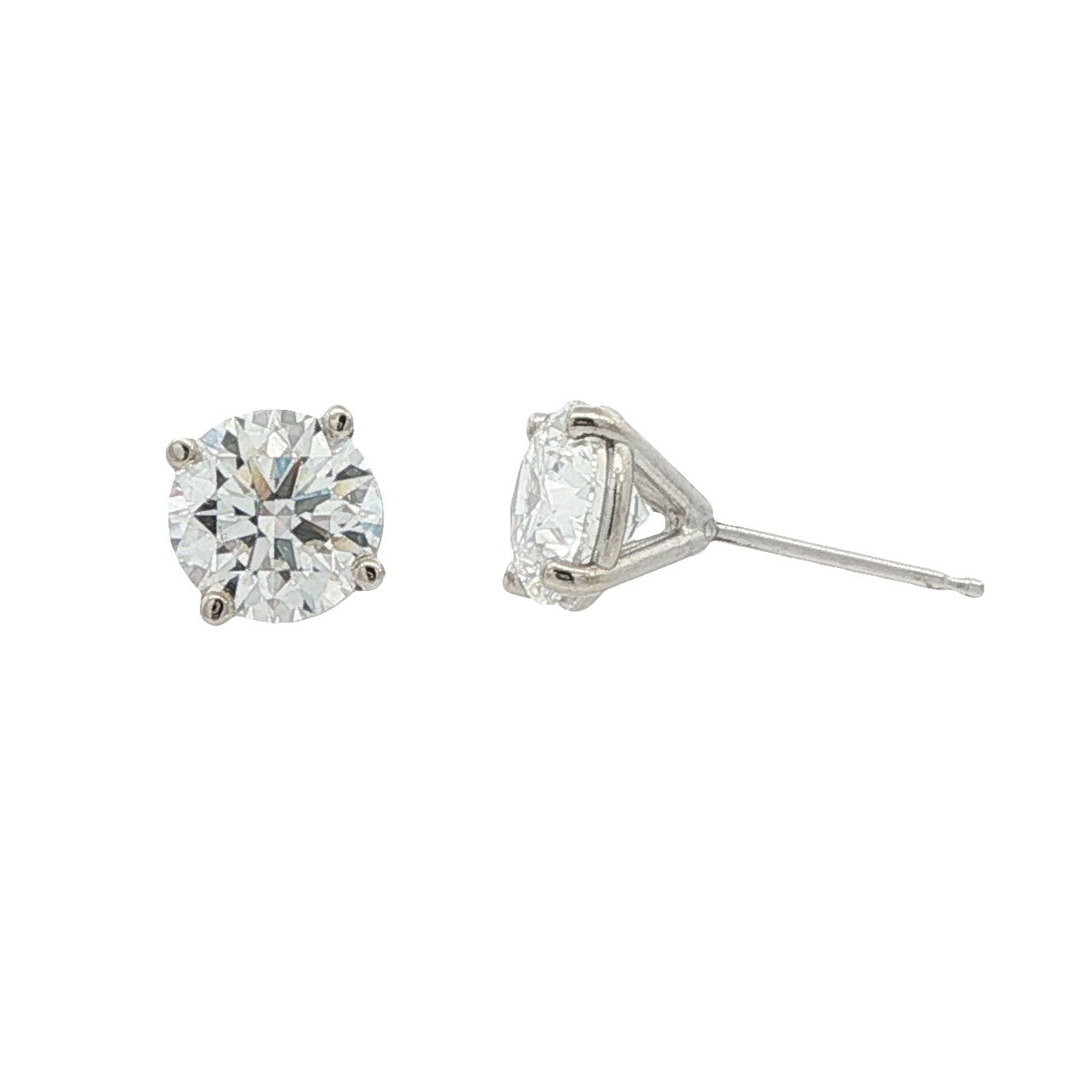 14K White gold studs with round brilliant diamonds. Item J38584 - ABC Jewelry Co. 