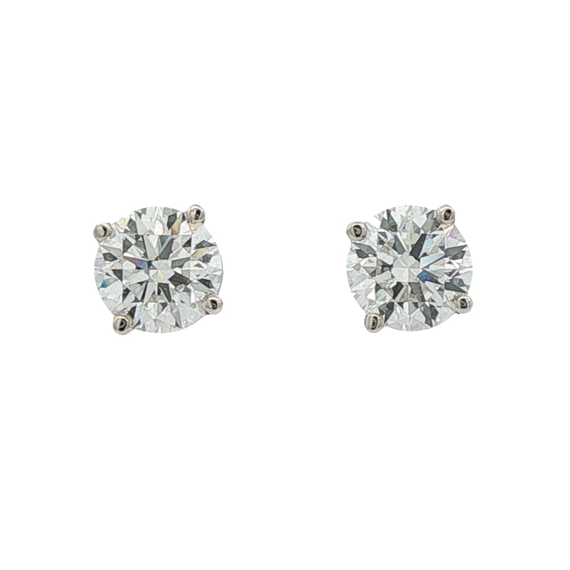 14K White gold studs with round brilliant diamonds. Item J38584 - ABC Jewelry Co. 