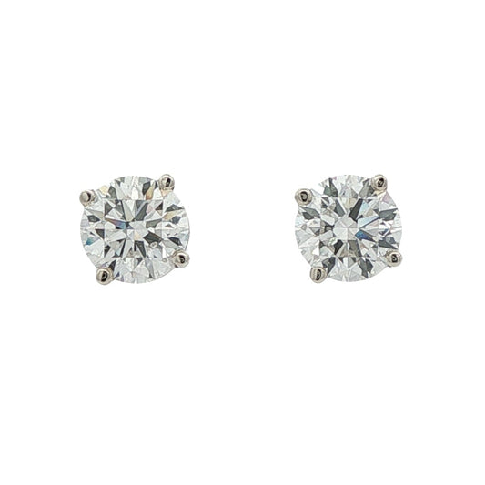 14K White gold studs with round brilliant diamonds. Item J38584 - ABC Jewelry Co. 