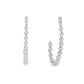 14K White gold earring jackets, hoop style, set with round brilliant diamonds. Item J38523 - ABC Jewelry Co. 