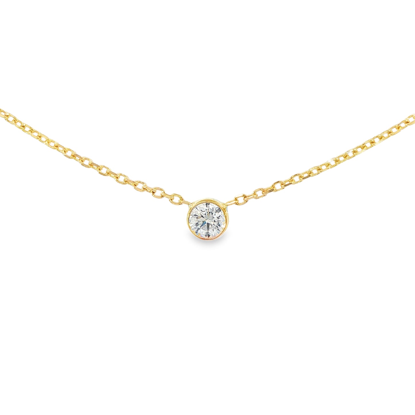 14K Yellow gold necklace with one bezel set round brilliant diamond. Item J38629 - ABC Jewelry Co. 