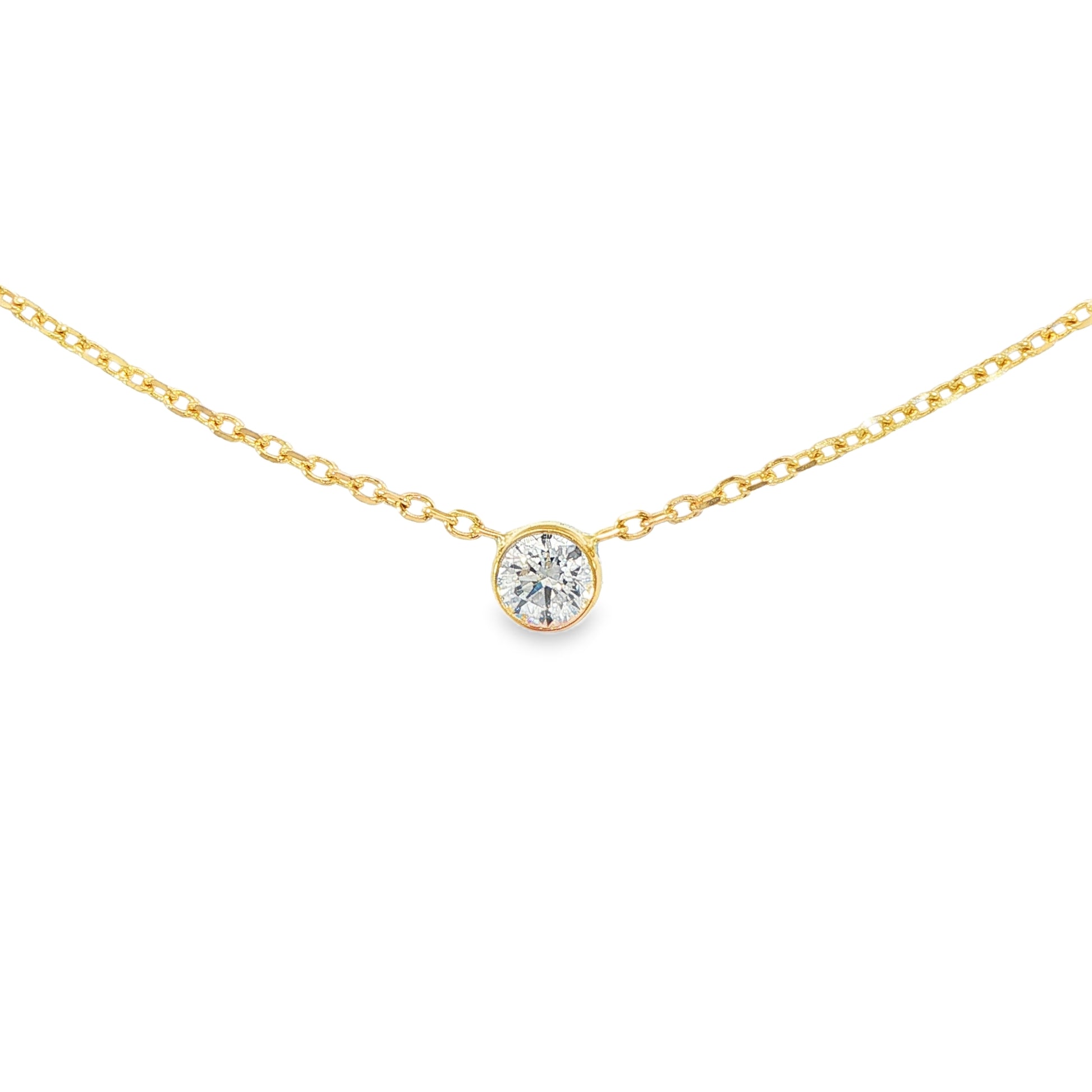 14K Yellow gold necklace with one bezel set round brilliant diamond. Item J38629 - ABC Jewelry Co. 