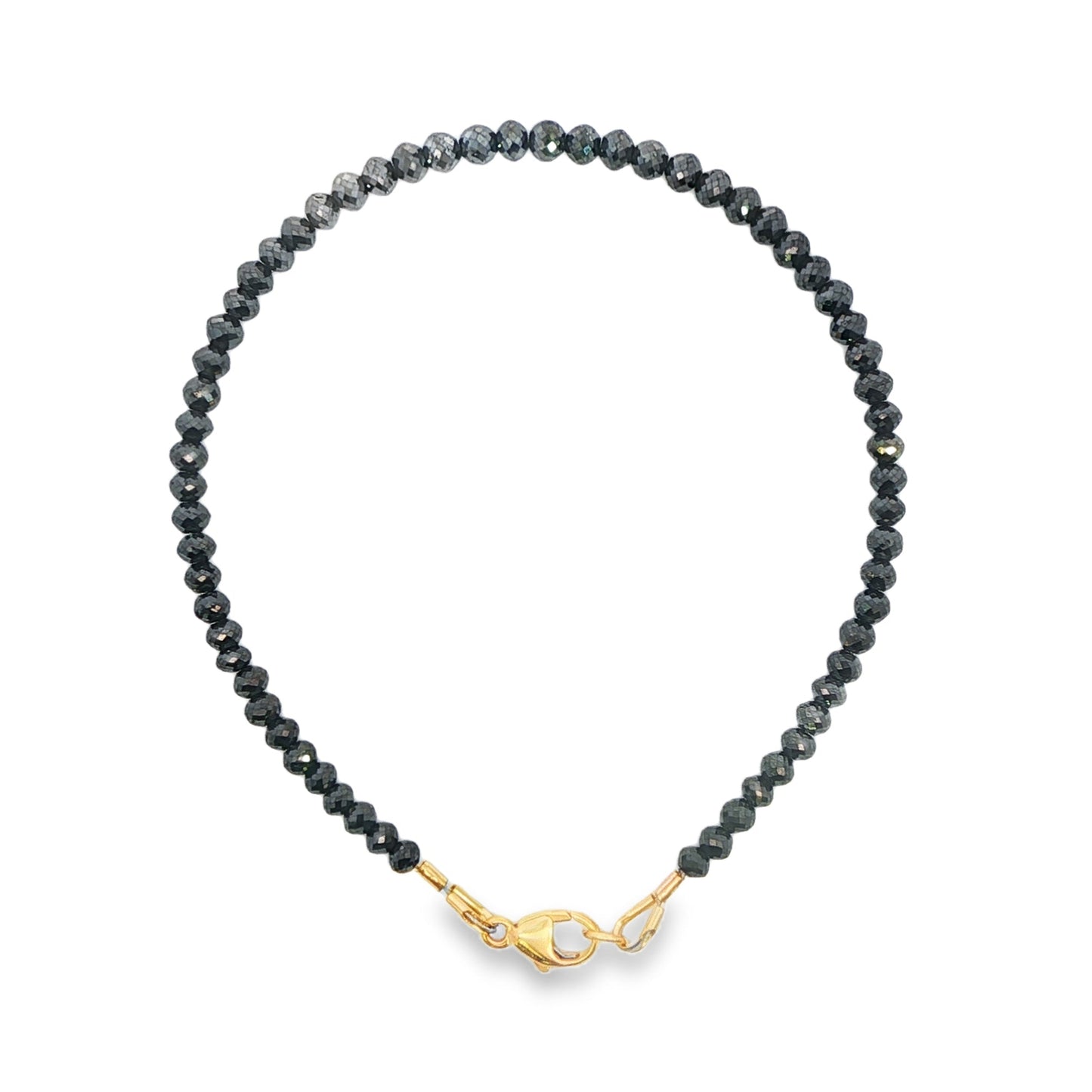 Black diamond strand bracelet with 14K yellow gold clasp. Item J38679 - ABC Jewelry Co.