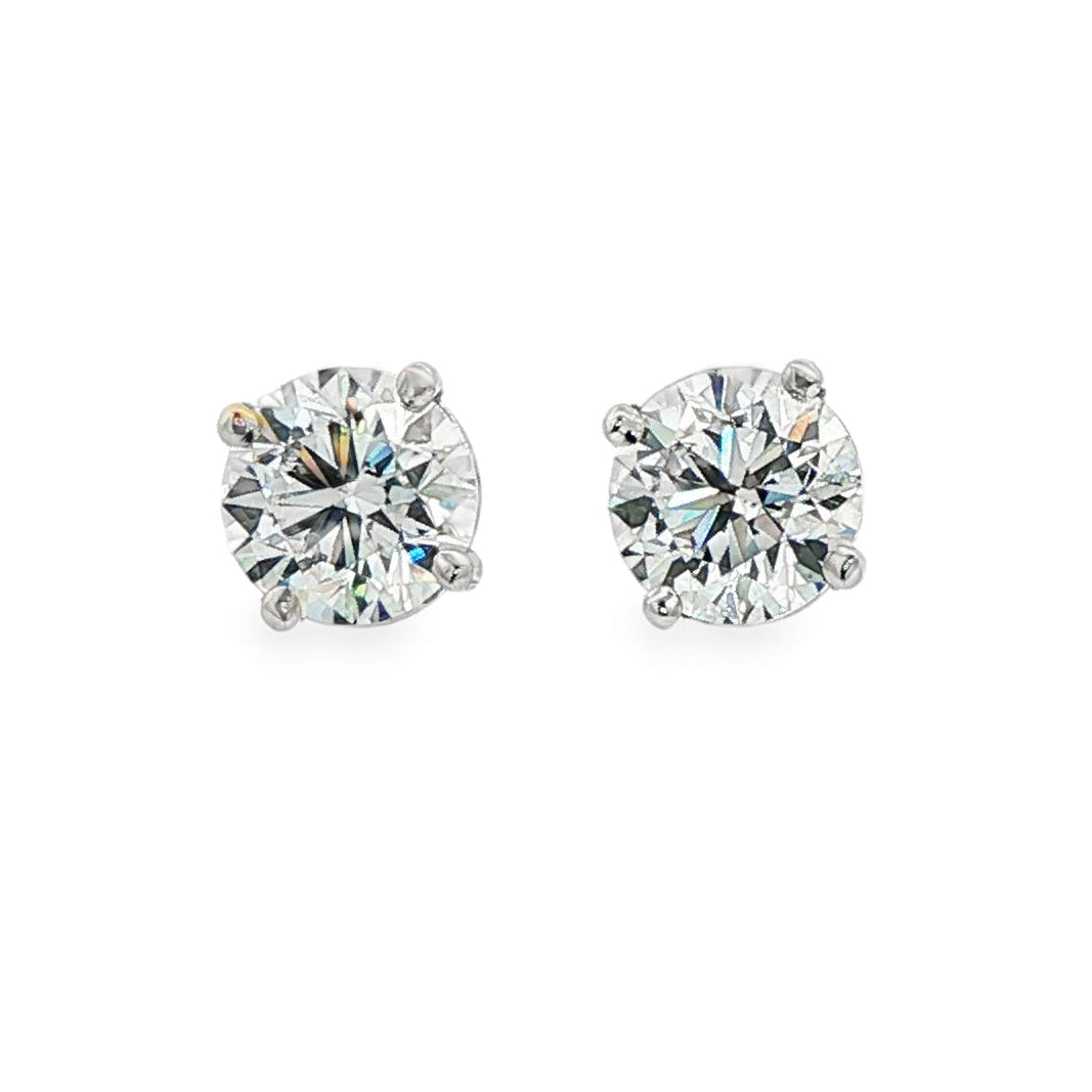 14K White gold diamond stud earrings. Item J38704 - ABC Jewelry Co.
