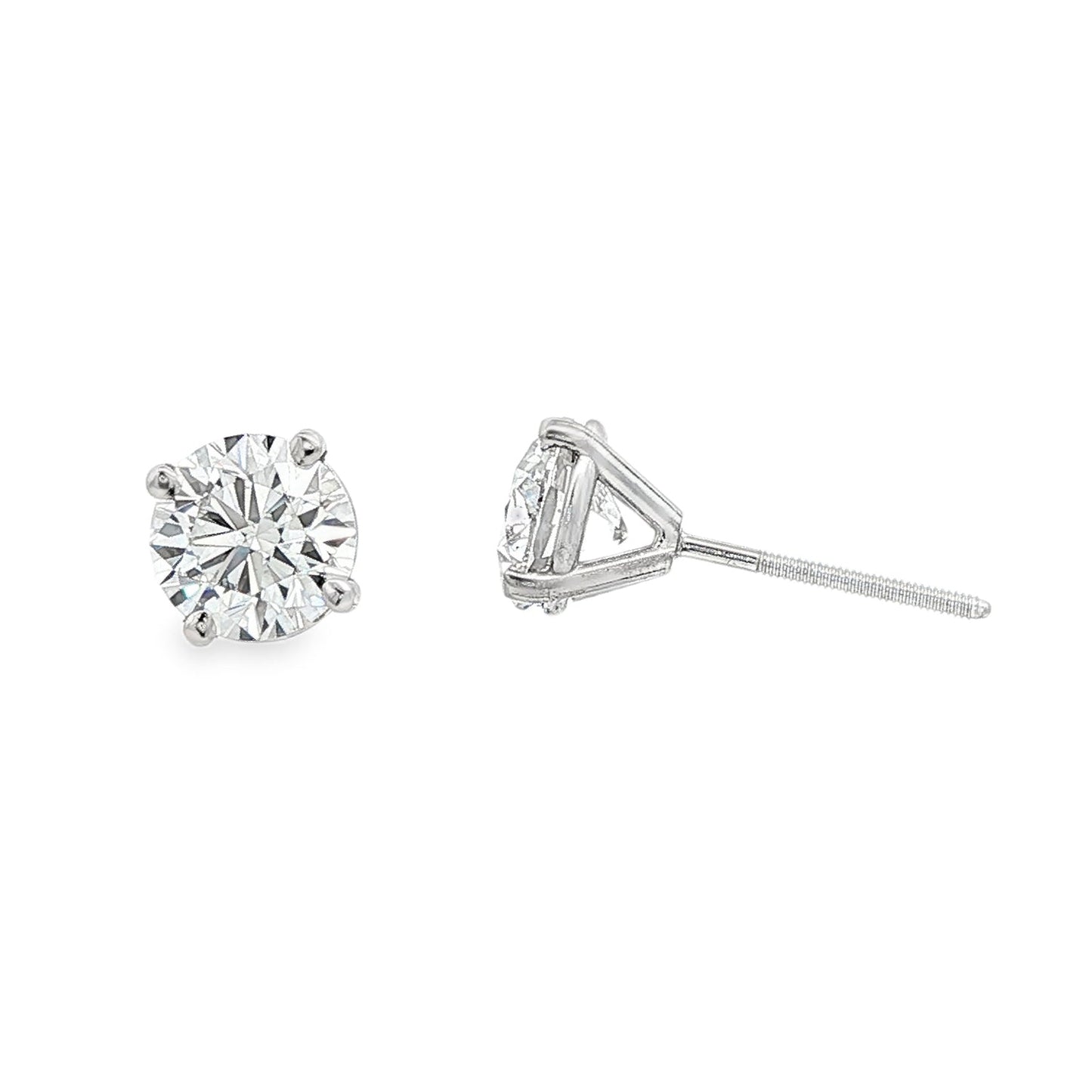 14K White gold diamond stud earrings. Item J38704 - ABC Jewelry Co.