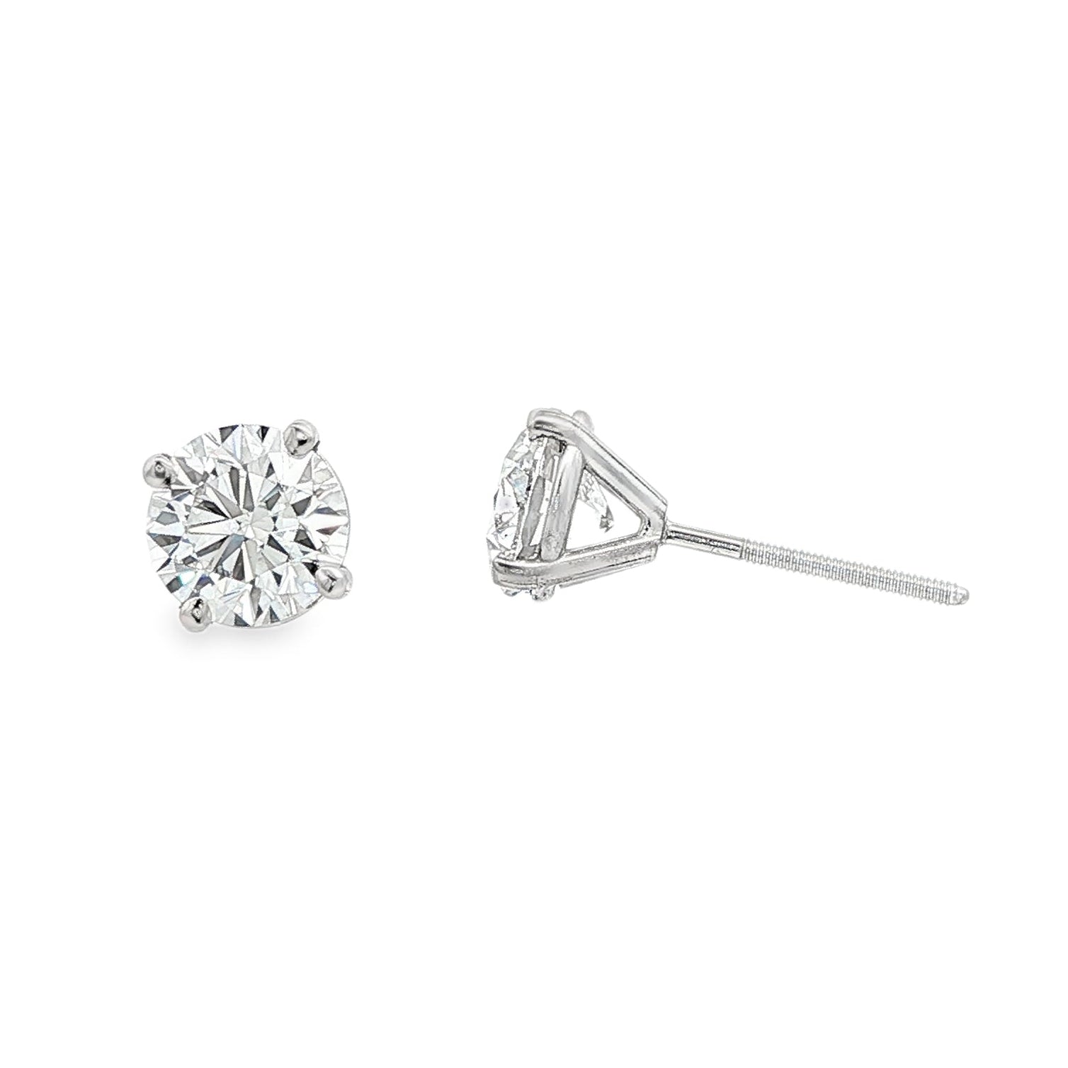 14K White gold diamond stud earrings. Item J38704 - ABC Jewelry Co.