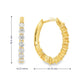 14K Yellow gold oval hoop earrings set with round brilliant diamonds. Item J38766 - ABC Jewelry Co.