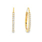 14K Yellow gold oval hoop earrings set with round brilliant diamonds. Item J38769 - ABC Jewelry Co.