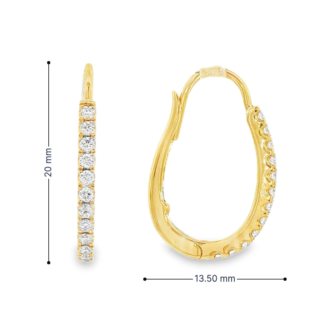 14K Yellow gold oval hoop earrings set with round brilliant diamonds. Item J38769 - ABC Jewelry Co.