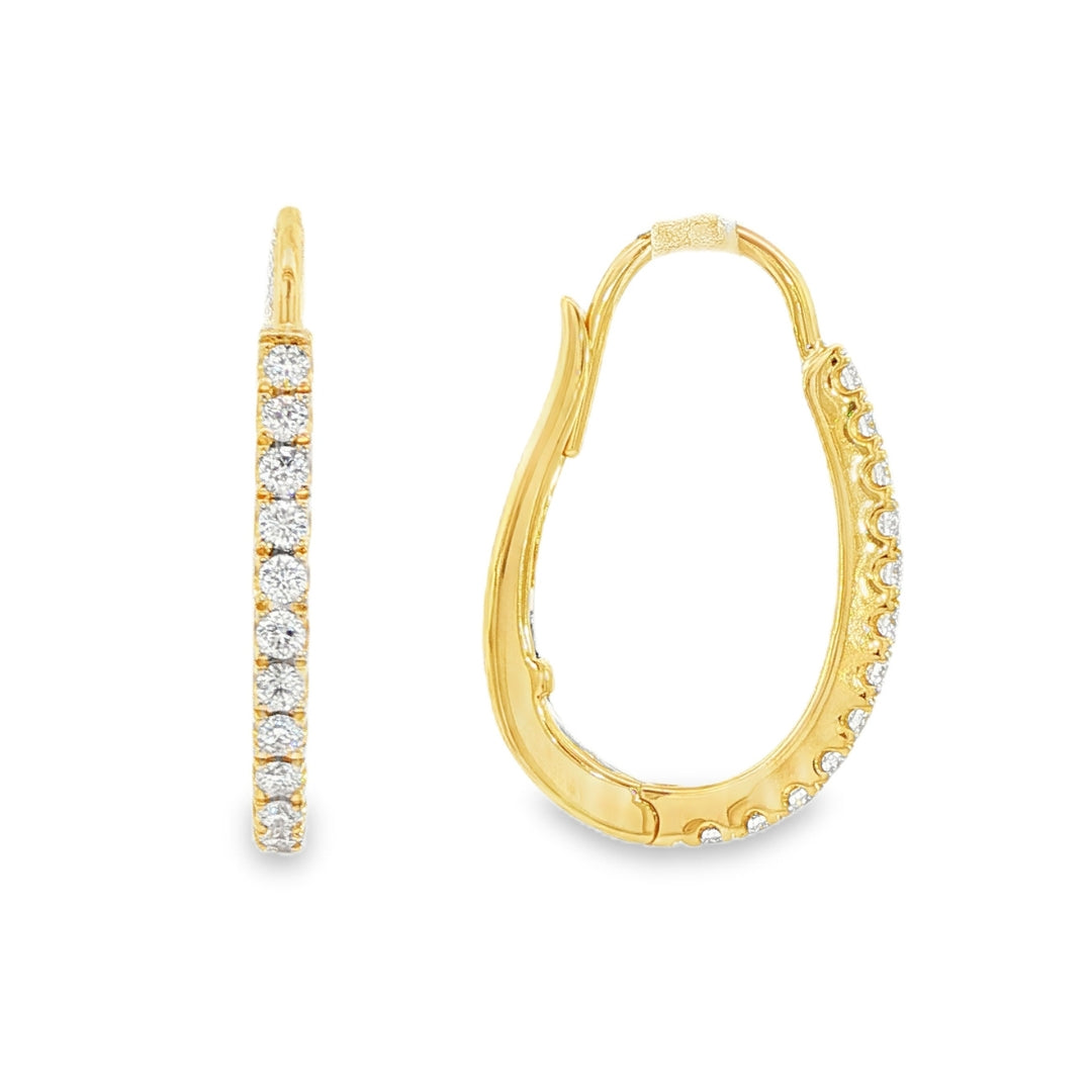 14K Yellow gold oval hoop earrings set with round brilliant diamonds. Item J38769 - ABC Jewelry Co.