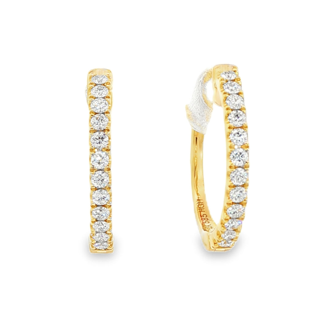 14K Yellow gold hoop earrings set with round brilliant diamonds. Item J38770 - ABC Jewelry Co. 