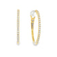 14K Yellow gold hoop earrings set with round brilliant diamonds. Item J38771 - ABC Jewelry Co