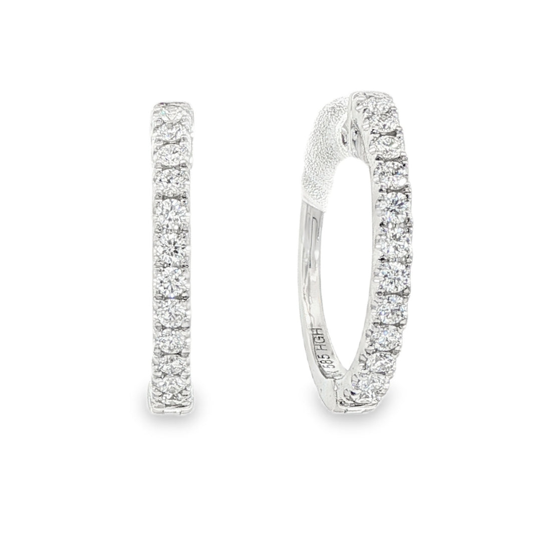 14K White gold hoop earrings set with round brilliant diamonds. Item number J38778 - ABC Jewelry Co.