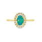 14K Yellow gold ring set with an oval shape opal center stone surrounded by a diamond halo. Item J38784 - ABC Jewelry Co. 