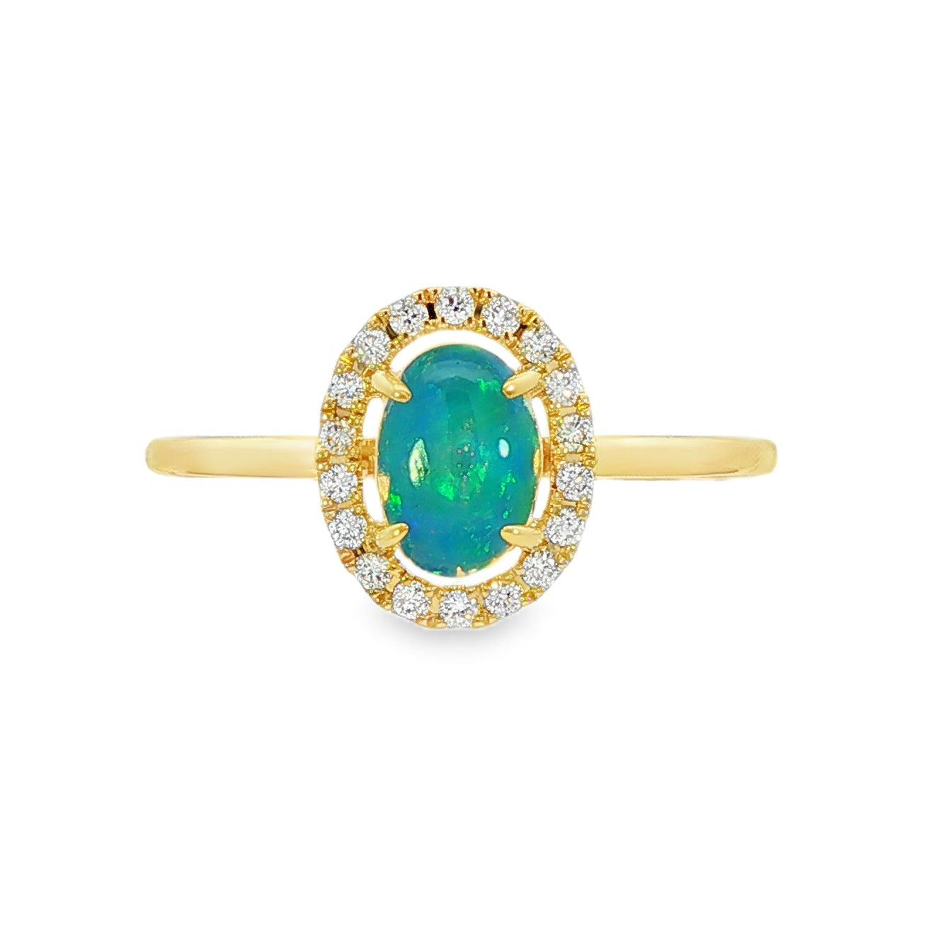 14K Yellow gold ring set with an oval shape opal center stone surrounded by a diamond halo. Item J38784 - ABC Jewelry Co. 